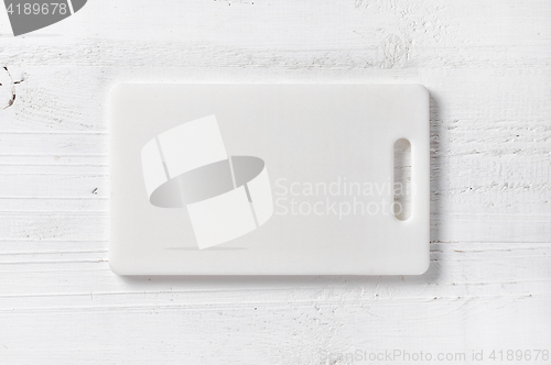 Image of white plastic cutting board