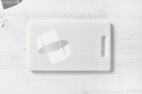 Image of white plastic cutting board