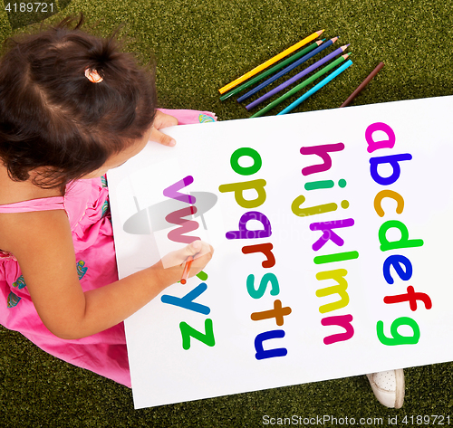 Image of Girl Writing Alphabet Shows Kid Learning