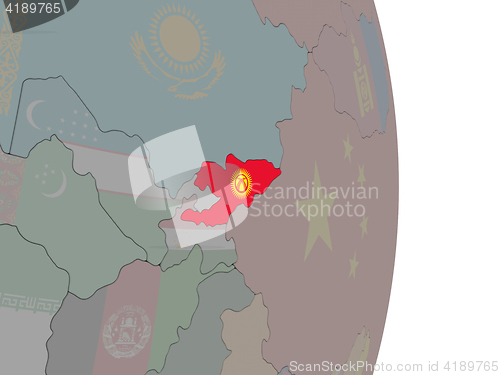 Image of Kyrgyzstan with its flag