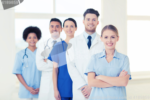 Image of group of doctors and nurses at hospital