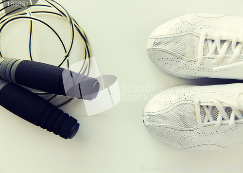 Image of close up of sneakers and skipping rope