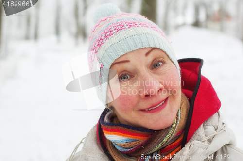 Image of Portrait of a woman in a winter park