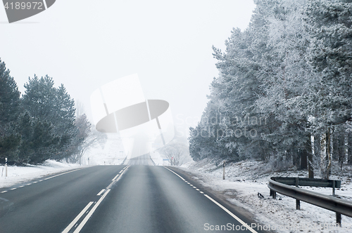 Image of Highway in the winter, the trees covered with hoarfrost