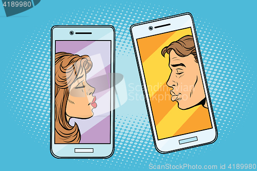 Image of Retro boy and girl want to kiss via a smartphone