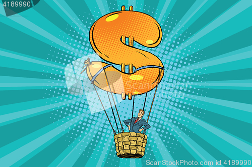 Image of businessman in a hot air balloon dollar