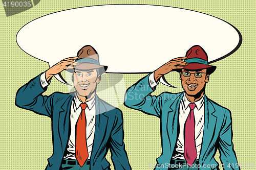 Image of Joyful white and black businessmen in retro hats