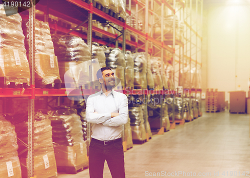 Image of happy man at warehouse