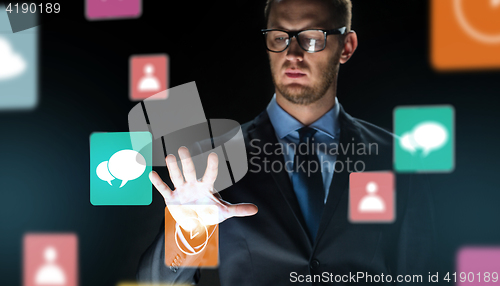 Image of close up of businessman touching virtual screen