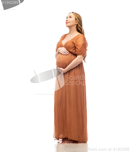 Image of happy pregnant woman touching her big belly