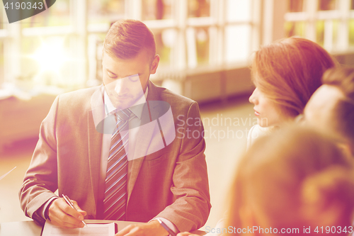 Image of business people meeting at office