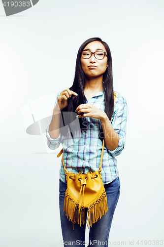 Image of young pretty asian woman posing cheerful emotional isolated on white background, lifestyle people concept