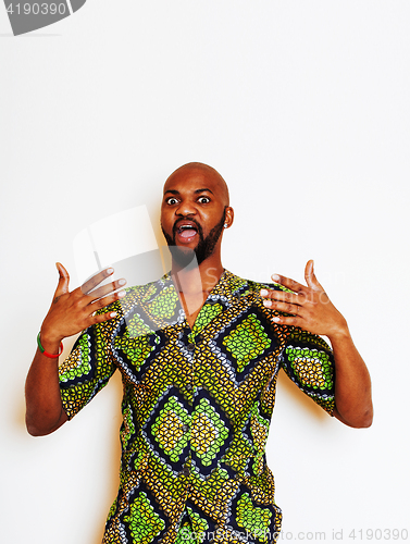 Image of portrait of young handsome african man wearing bright green nati