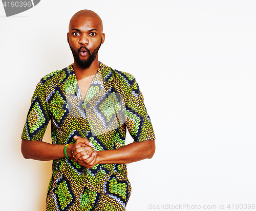 Image of portrait of young handsome african man wearing bright green nati