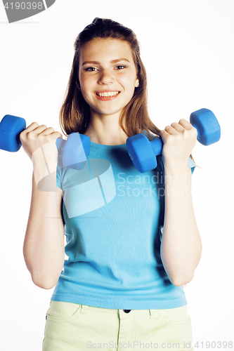 Image of young pretty slim woman with dumbbell isolated cheerful smiling, real sport girl next door, lifestyle people concept