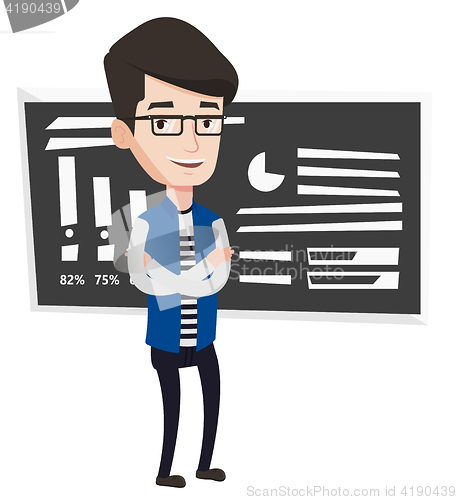 Image of Teacher or student standing in front of chalkboard