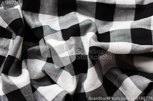 Image of close up of checkered fabric or clothing item