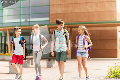 Image of group of happy elementary school students walking