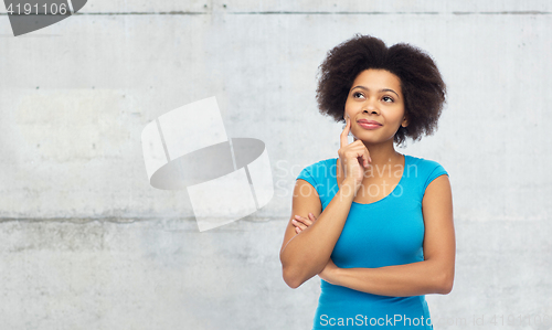 Image of happy afro american young woman over white