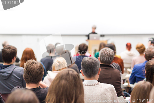 Image of Woman giving presentation on business conference.