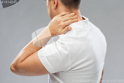 Image of close up of man suffering from neck pain