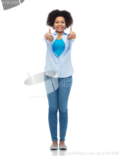 Image of happy african american woman showing thumbs up