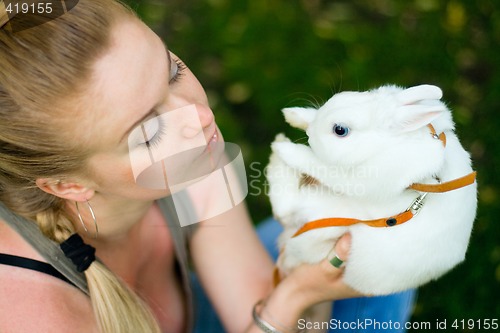 Image of girl with white rabbit