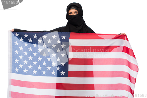 Image of muslim woman in hijab with american flag