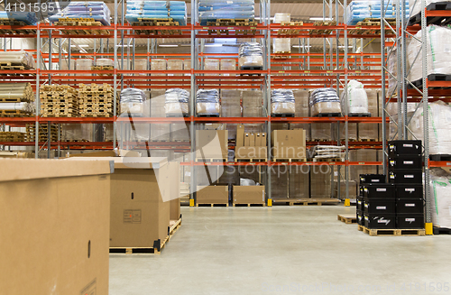 Image of cargo boxes storing at warehouse shelves