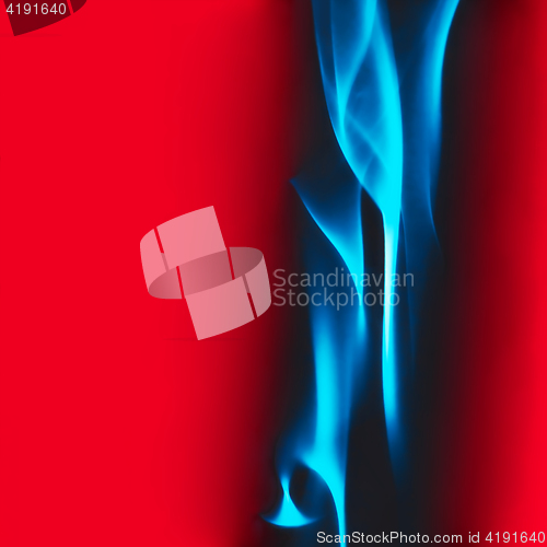 Image of Blue Smoke On a Red Background