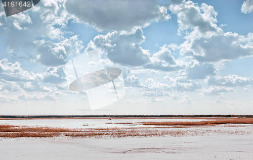 Image of  Lake Among Quartz Sand Under Beautiful Cloudy Sky