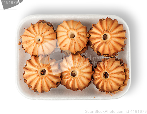 Image of Shortbread biscuits with filling in plastic tray top view