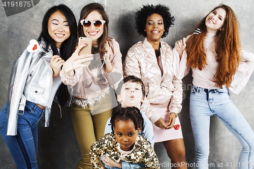 Image of Lifestyle and people concept: young pretty diversity nations woman with different age children celebrating on birth day party together happy smiling, making selfie. African-american, asian and caucasi