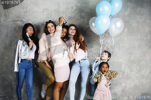 Image of Lifestyle and people concept: young pretty diversity nations woman with different age children celebrating on birth day party together happy smiling, making selfie. African-american, asian and caucasi