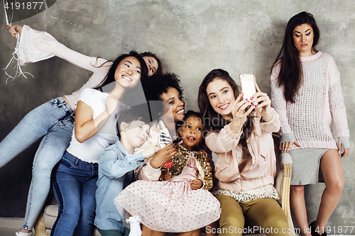 Image of Lifestyle and people concept: young pretty diversity nations woman with different age children celebrating on birth day party together happy smiling, making selfie. African-american, asian and caucasi