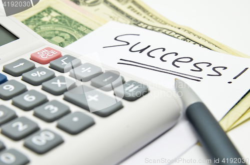Image of Hand written success word on paper