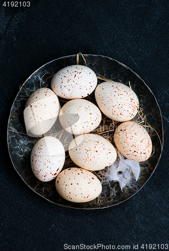 Image of raw chicken eggs