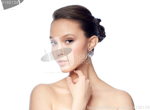 Image of close up of beautiful woman face with earring