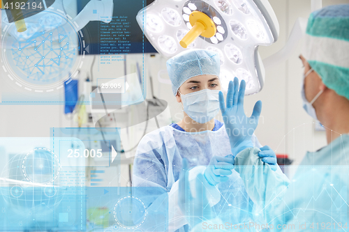 Image of surgeons in operating room at hospital