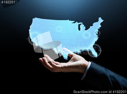 Image of hand with map of united states of america