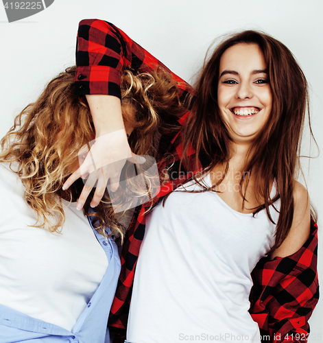 Image of best friends teenage girls together having fun, posing emotional on white background, besties happy smiling, lifestyle people concept 