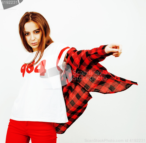 Image of young pretty teenage hipster girl posing emotional happy smiling on white background, lifestyle people concept 