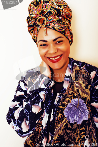 Image of beauty bright african woman with creative make up, shawl on head