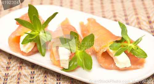 Image of appetizers with red fish