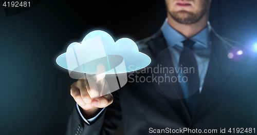 Image of businessman touching virtual cloud projection