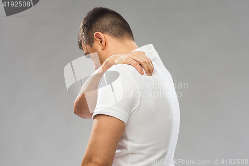 Image of close up of man suffering from backache