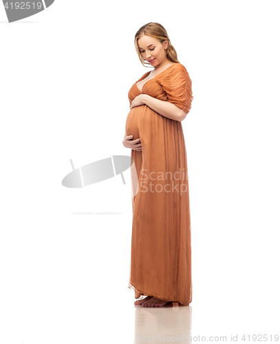 Image of happy pregnant woman touching her big belly