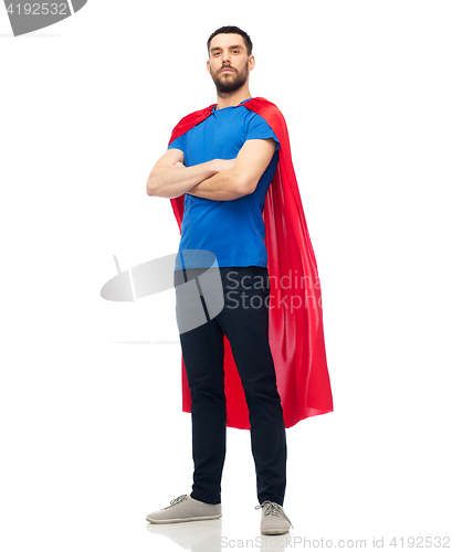 Image of man in red superhero cape