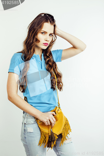Image of young pretty long hair woman happy smiling isolated on white background, wearing cute tiny handbag, lifestyle people concept