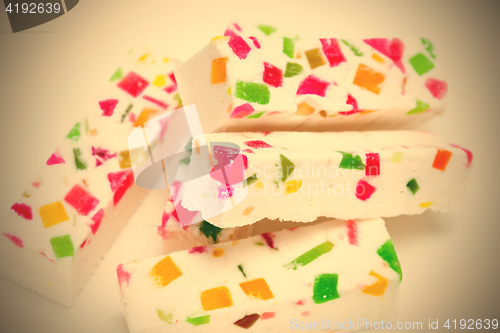 Image of marshmallow sticks with fruit pieces